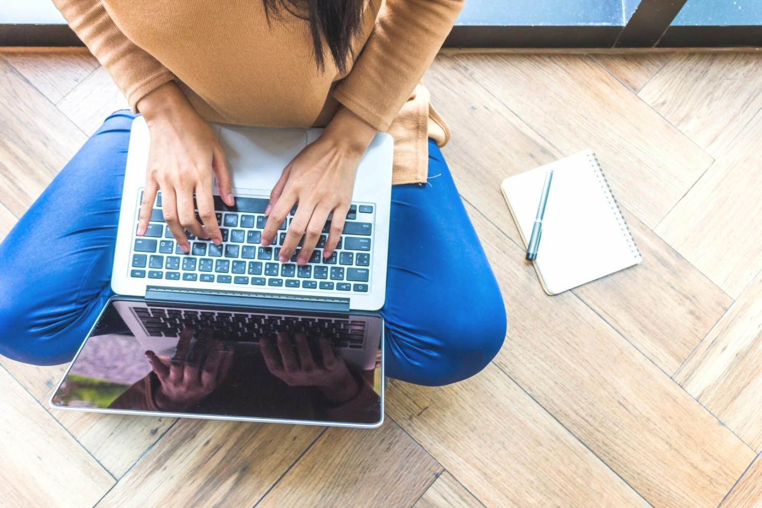 Modern tech learning environment with students working on diverse programming projects